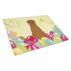 Caroline&apos;s Treasures BB6073LCB Easter Eggs Dogue De Bourdeaux Glass Cutting Board - Large
